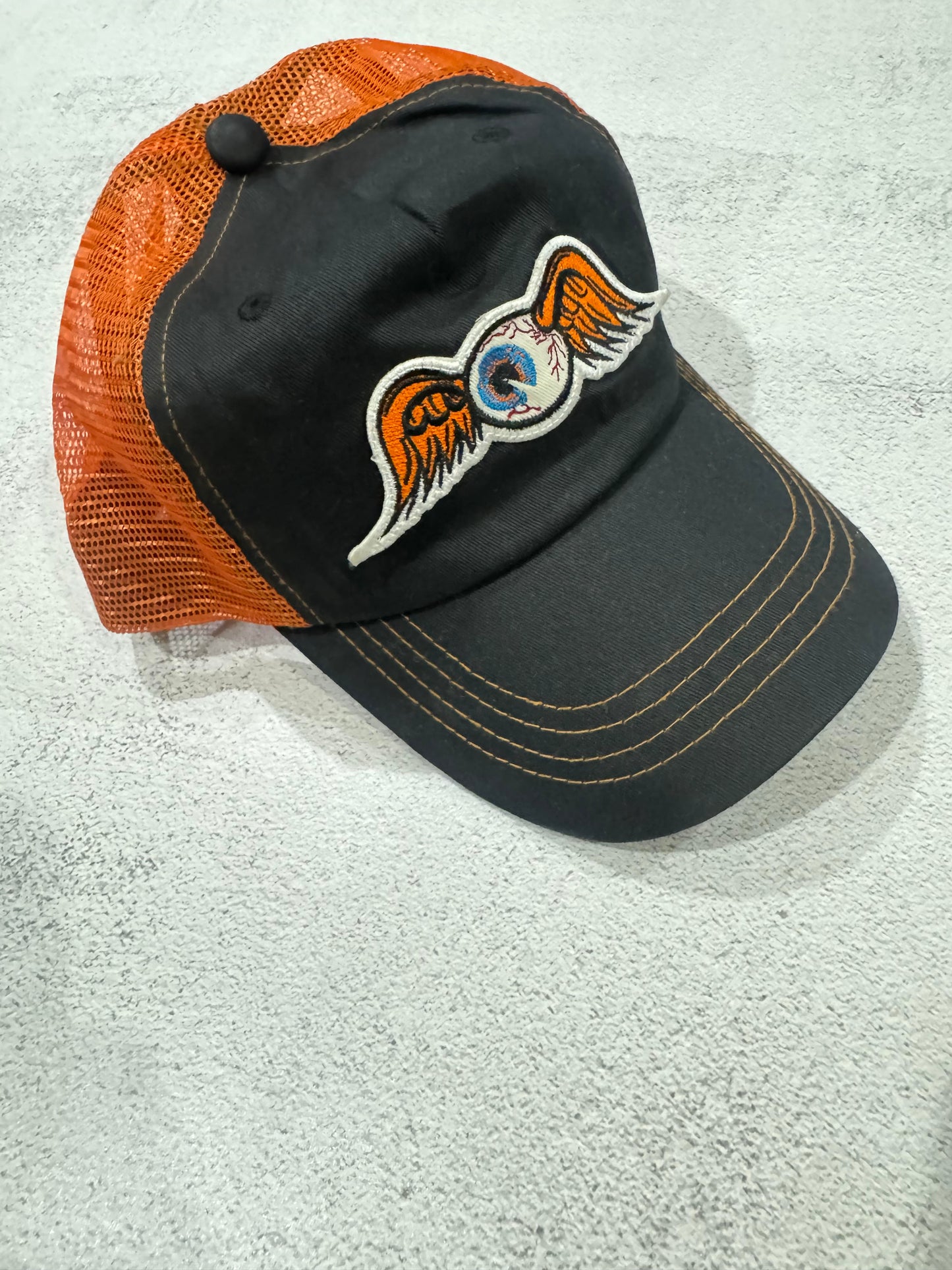 Vintage 00s Von Dutch "Flying Eyeball" Y2K Trucker Cap BLACK/ORANGE Mesh